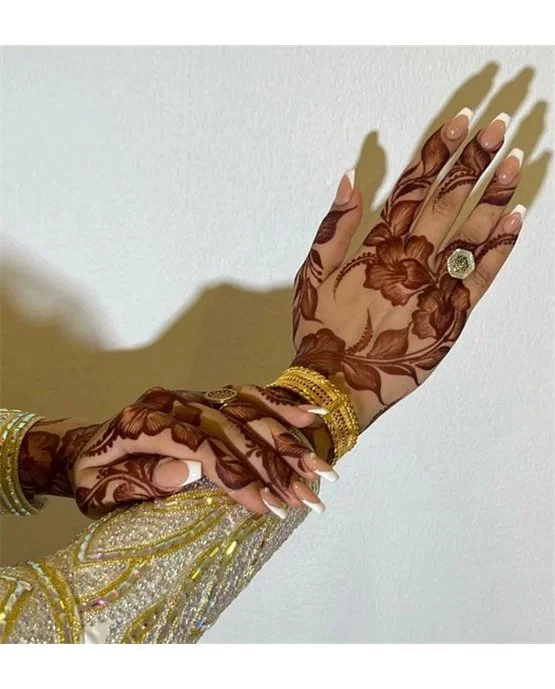 Rose Inspired Heavy Back Hand Mehndi Design